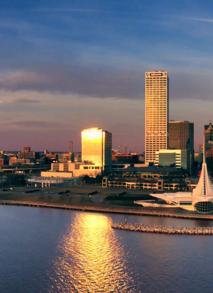 Milwaukee skyline over Lake Michigan at sunset