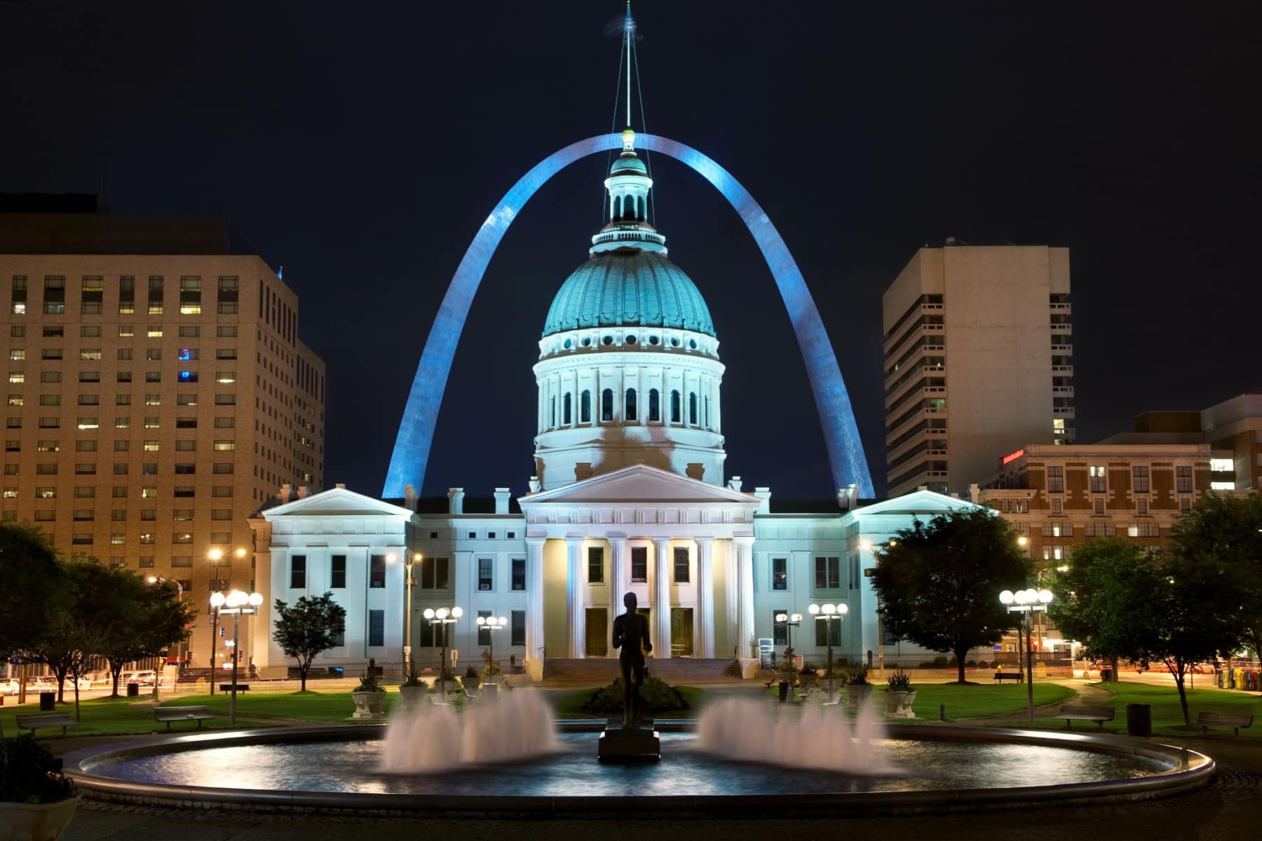 The Old Courthouse stands framed under the Gateway Arch in St. Louis.